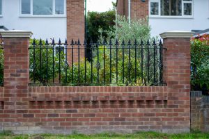 Large decorative wrought iron garden wall railing