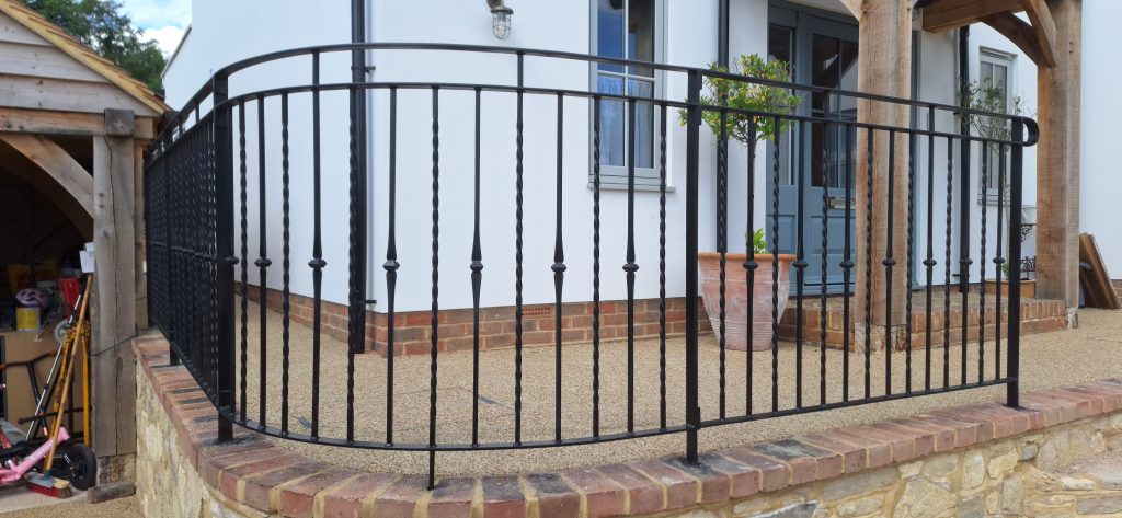 curved wrought iron railing