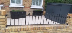 classic iron railing on wall