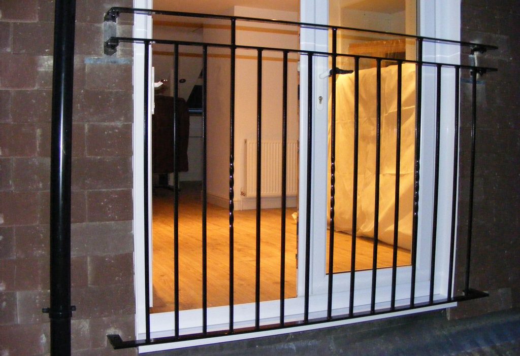 Tile hung wall with Juliet balcony