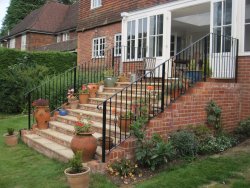 Handrail going down steps in Haywards Heath