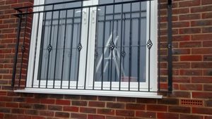 Brick fixing Juliet balcony.