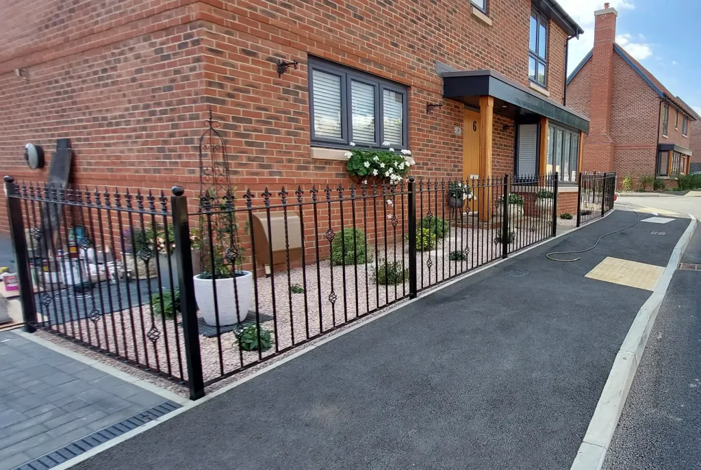 iron fence railings on uphill slope