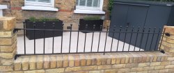 classic iron railing on wall